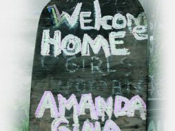 Bienvenida. Letrero colocado en el barrio de Cleveland donde viven las jóvenes secuestradas por Ariel Castro. ESPECIAL /