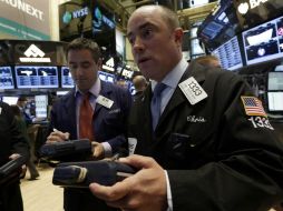 El índice compuesto del mercado Nasdaq subió un marginal 0.06 por ciento. AP /