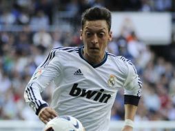 Mezut se incorpora a las prácticas merengues tras la lesión. ARCHIVO /