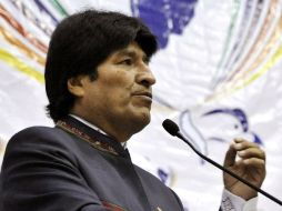 La Constitución limita a dos el número de mandatos consecutivos, pero el mandatario defiende que su primer gobierno no fue computable. AFP /