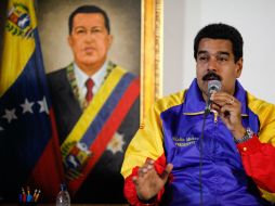 El presidente venezolano menciona que Chávez y Bolívar son ''dos hombres y dos épocas que logran hilvanarse y conectarse''. EFE /