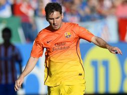 Lionel Messi le es fiel al ''tiki-taka'' del equipo que lo ha convertido en estrella. AP /
