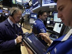 Wall Street cierra su jornada hoy y el Dow Jones de Industriales avanza el 0.4 por ciento. AP /