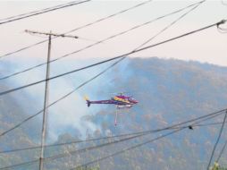 En el sofocamiento participaron 102 elementos de diversas corporaciones, además del helicóptero Colibrí de Semadet. EL INFORMADOR /