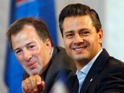 El Presidente Peña Nieto (d) y el titular de la SRE, José Antonio Meade participan en la VII Cumbre de la Alianza del Pacífico. AP /
