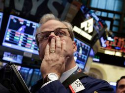La Bolsa de Nueva York finaliza una jornada muy volátil que comenzó con descensos claros. AP /