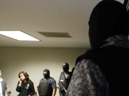 La policía logra dar con los presuntos delincuentes después de realizar una investigación. ARCHIVO /