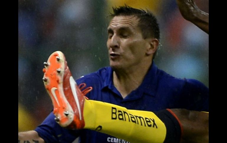 Giménez es sancionado por acumular cinco amonestaciones luego de que vio el cartón amarillo durante el Clausura ante el América. ARCHIVO /