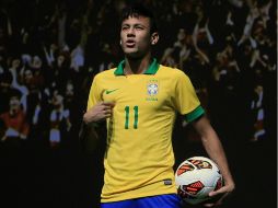 El atacante ya sueña con estar al lado de figuras como Messi, Xavi, e Iniesta. EFE /