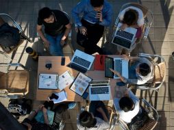 Cibernavegantes chinos, en un cibercafé en Beijing. AFP /
