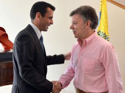 El presidente de Colombia, Juan Manuel Santos y el líder opositor venezolano, Henrique Capriles, se reunieron en Bogotá. ARCHIVO /