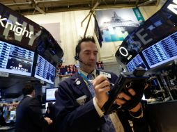 El índice compuesto del mercado tecnológico Nasdaq cierra sesión con incremento del 0.69 por ciento. AP /