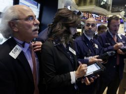 La bolsa inicia una fase de recogida de beneficios para cerrar el mes. AP /