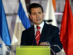 Peña Nieto destaca que México es el tercer país que más ha invertido en Guatemala. AFP /
