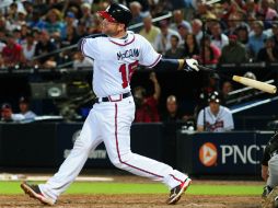 Brian McCann se luce en la séptima entrada. AFP /