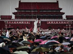 Más de 150 mil personas participaron en la vigilia por el vigésimo cuarto aniversario de la represión militar en Tiananmen. AFP /