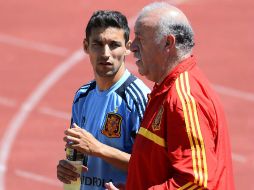 El jugador español durante su entrenamiento con Vicente del Bosque. AFP /
