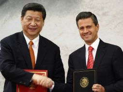 Los mandatarios de México y China llegan a acuerdos en materia energética. AP /