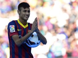 De acuerdo al diario ''Marca'', Neymar asume el rol secundario frente a Messi. ARCHIVO /