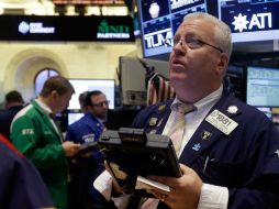 El índice restó 9.53 puntos hasta alcanzar las 15 mil 238.59 unidades. AP /