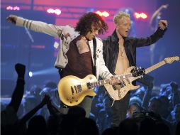 Pese a su enfermedad Vivian (i) no dejará a su banda para su gira de verano. AP /