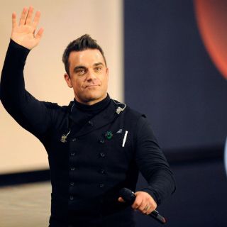 Robbie Williams desea hacer dueto con Psy
