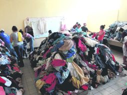 AYUDA A POBLADORES DE TEUCHITLÁN. Los ciudadanos viven los estragos posteriores de la tormenta en la que perdieron sus pertenencias. EL INFORMADOR /