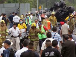 Servicios Periciales se encuentran en el lugar para iniciar actuaciones judiciales correspondientes. AFP /