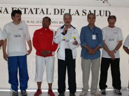 Jaime Agustín González (c) invita a los jaliscienses a sumar esfuerzos para generar la cultura del cambio.  /