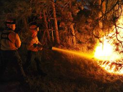 El incendio estalló el martes en las afueras de Colorado Springs en medio de un intenso calor y humedad extremamente baja. ARCHIVO /