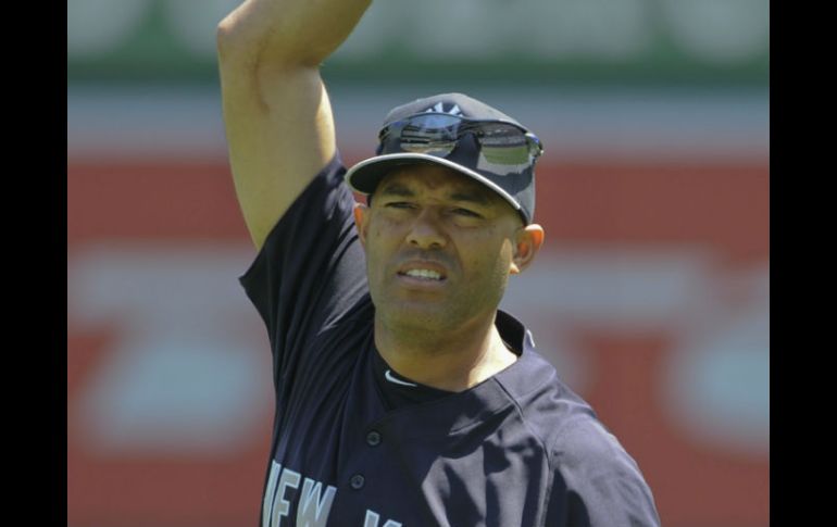 Mariano Rivera define el triunfo de los Yankees al retirar tres lanzamientos a Pujols. AP /