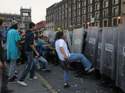 A los jóvenes se les acusó de los delitos de ultraje a la autoridad, ataques a la paz pública y daño a la propiedad. ARCHIVO /