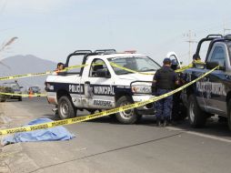 A la escena del enfrentamiento acudieron elementos de la Fiscalía General del Estado para iniciar las investigaciones del caso. ARCHIVO /