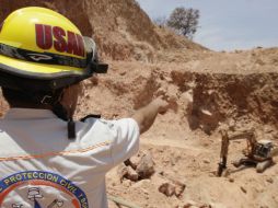 Se realizan investigaciones para determinar con precisión el origen del fuego en la mina. ARCHIVO /