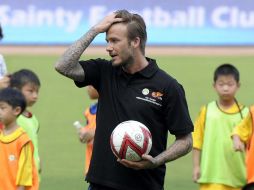 El astro inglés habría sido buscado por la NFL para dar un giro a su carrera. AP /