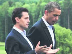 Enrique Peña Nieto y Barack Obama conversan en la Cumbre del Grupo de los Ocho (G-8). NTX /