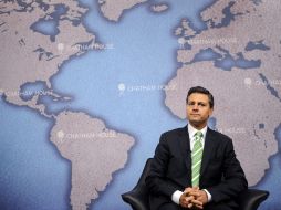 En Londres, Peña Nieto, pronuncia su discurso para explicar las reformas estructurales aplicadas en México. EFE /