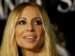 La ex vocalista del grupo Olé Olé, contenta al encontrar un médico maravilloso. AP /