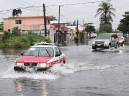 Una calle inundada por la tormenta tropical ''Barry'' en Veracruz. EFE /
