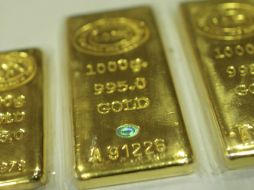 El precio de la onza del metal precioso termina en mil 292.50 dólares. ARCHIVO /