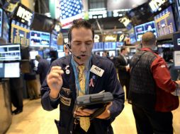 Wall Street rompe hoy la racha de pérdidas de los últimos dos días y el Dow Jones aumenta el 0.29 por ciento. AFP /