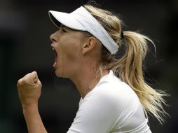 María sufre en el primer set pero sale avante en su primer juego. AP /