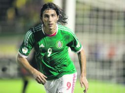 El ariete mexicano aún no estampa su firma como rojiblanco, pues depende de los exámenes médicos. MEXSPORT /