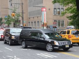 La carroza con los restos del actor, en camino a las últimas honras fúnebres. AFP /