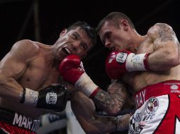 Imagen de la última pelea de Martínez ante Murray donde quedó lesionado. ARCHIVO /