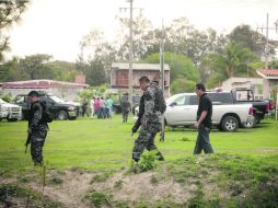 Elementos de la Fiscalía buscan indicios sobre el paradero de los dos menores desaparecidos hace más de una semana. EL INFORMADOR /