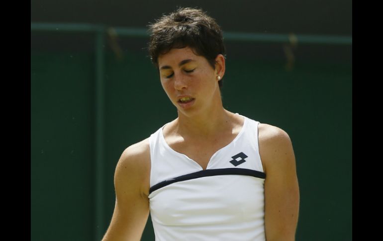 En la pista del All England Club, Carla se despide del certamen. AP /