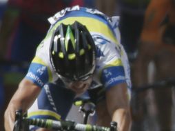 Así arriba a la meta Simon. AP /