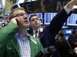 La bolsa de EU termina al alza por el crecimiento del sector manufacturero estadounidense. AP /