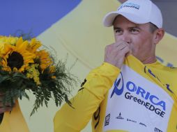 Simon vence en la última etapa y luce el sueter del primer lugar. AFP /